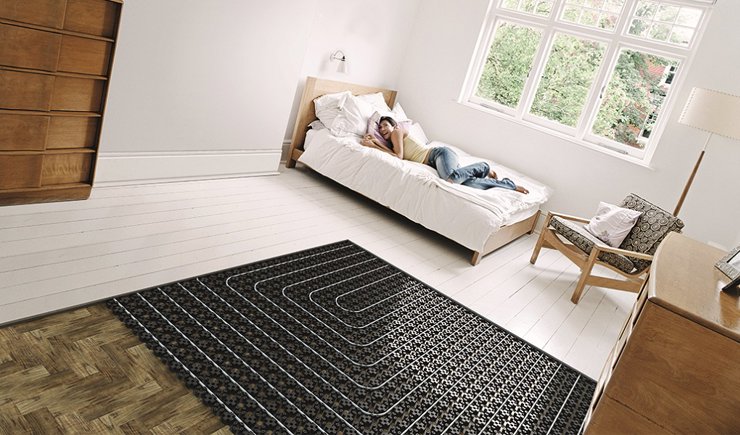 Low profile Uflex MINI underfloor heating system installed in bedroom