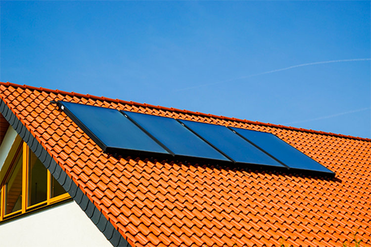 An installation of a Grant Solar Thermal installation featuring 4 on-roof collectors