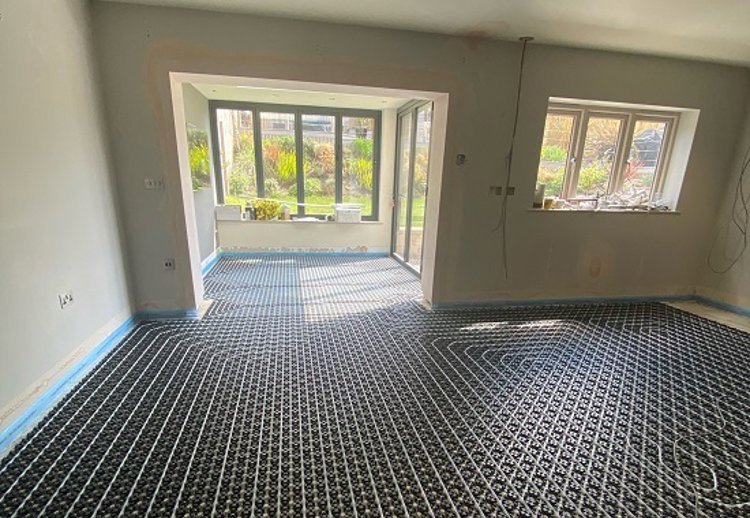 Keeping warm from the floor upwards with Grant underfloor heating