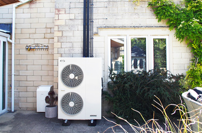 Case study image of R32 heat pump outside a non new build property