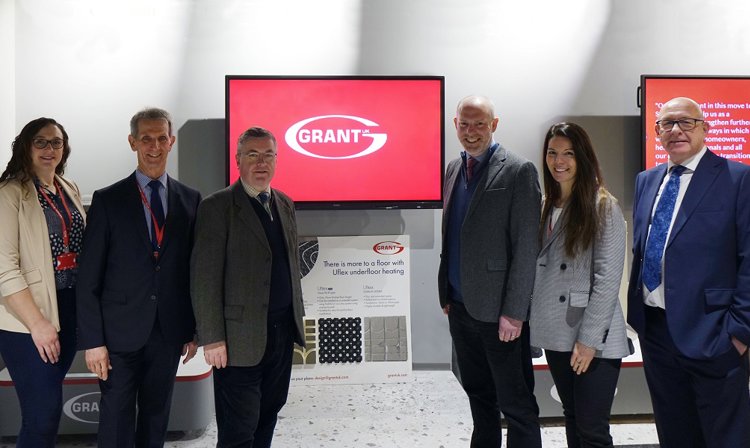 Members of Grant UK's Team with Sir Robert Buckland MP and Justin Tomlinson MP visiting the Company's HQ