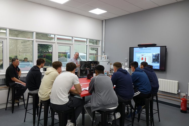 Students from New College Swindon learn about heat pumps with Grant UK